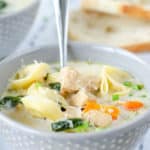 a bowl of creamy chicken tortellini soup