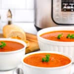 three bowls of tomato soup in front of an Instant Pot