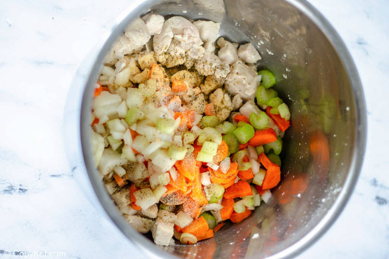 cooked chicken and vegetables in an Instant Pot bowl