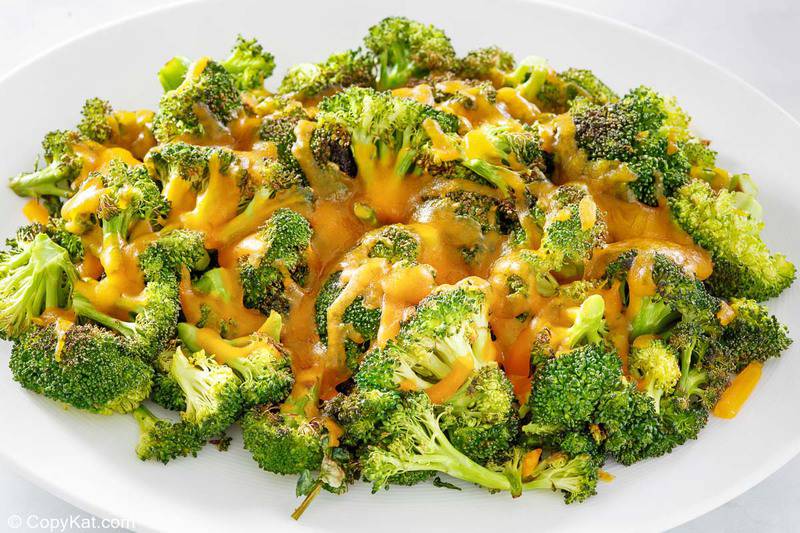 oven roasted broccoli and cheese on a platter