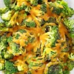 overhead view of Keto oven roasted broccoli and cheese on a platter