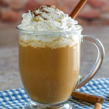 homemade Starbucks pumpkin spice latter in a glass coffee mug