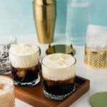 White Russian drinks, cocktail shaker, and ice bucket