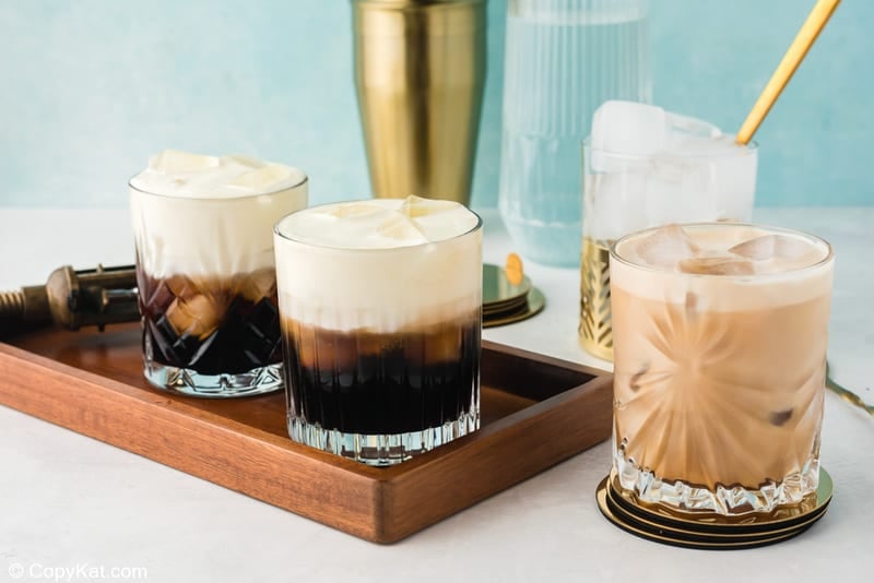 three White Russian cocktails, one stirred