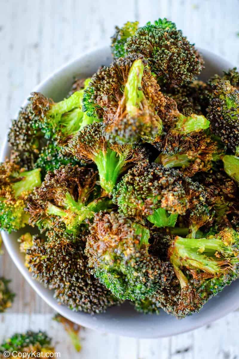 a bowl of air fryer broccoli