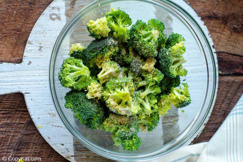 seasoned broccoli florets in a bowl
