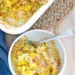 homemade Black Eyed Pea Yellow Squash Casserole in a baking dish and a bowl