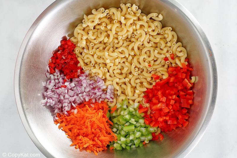 macaroni salad ingredients in a bowl
