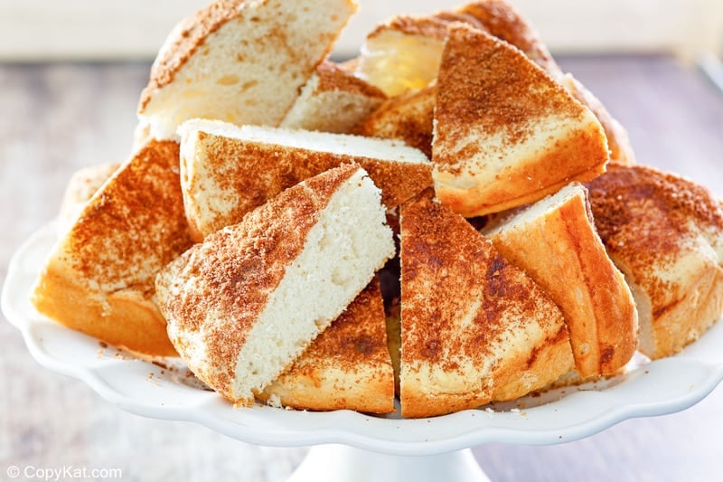 old fashioned coffee cake slices on a cake stand