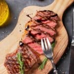 sirloin steak on a cutting board