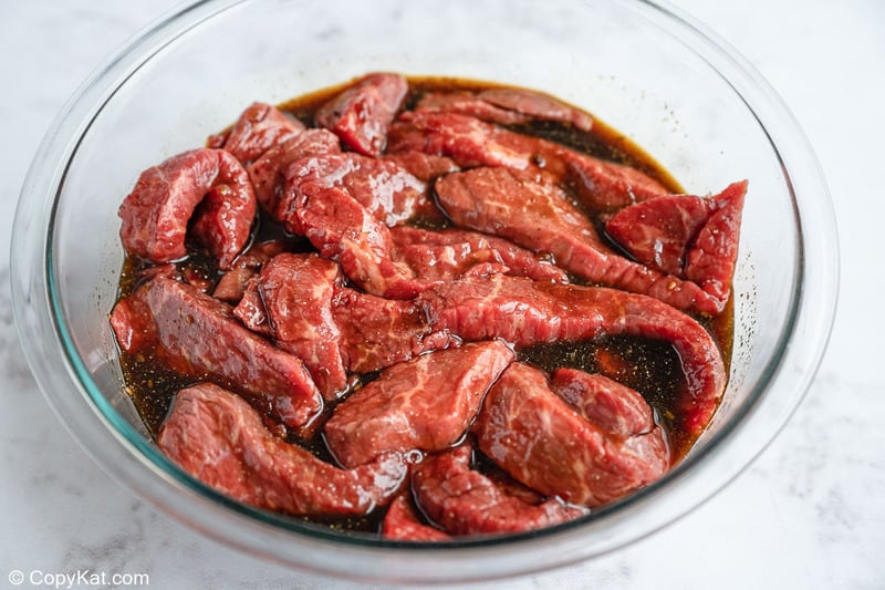 beef strips marinating for spicy beef jerky
