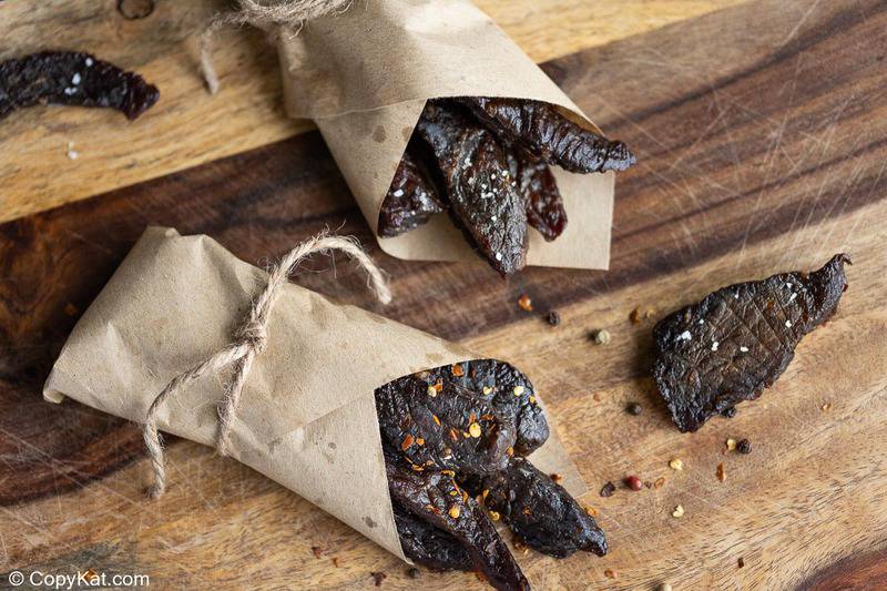 homemade spicy beef jerky wrapped up in parchment paper