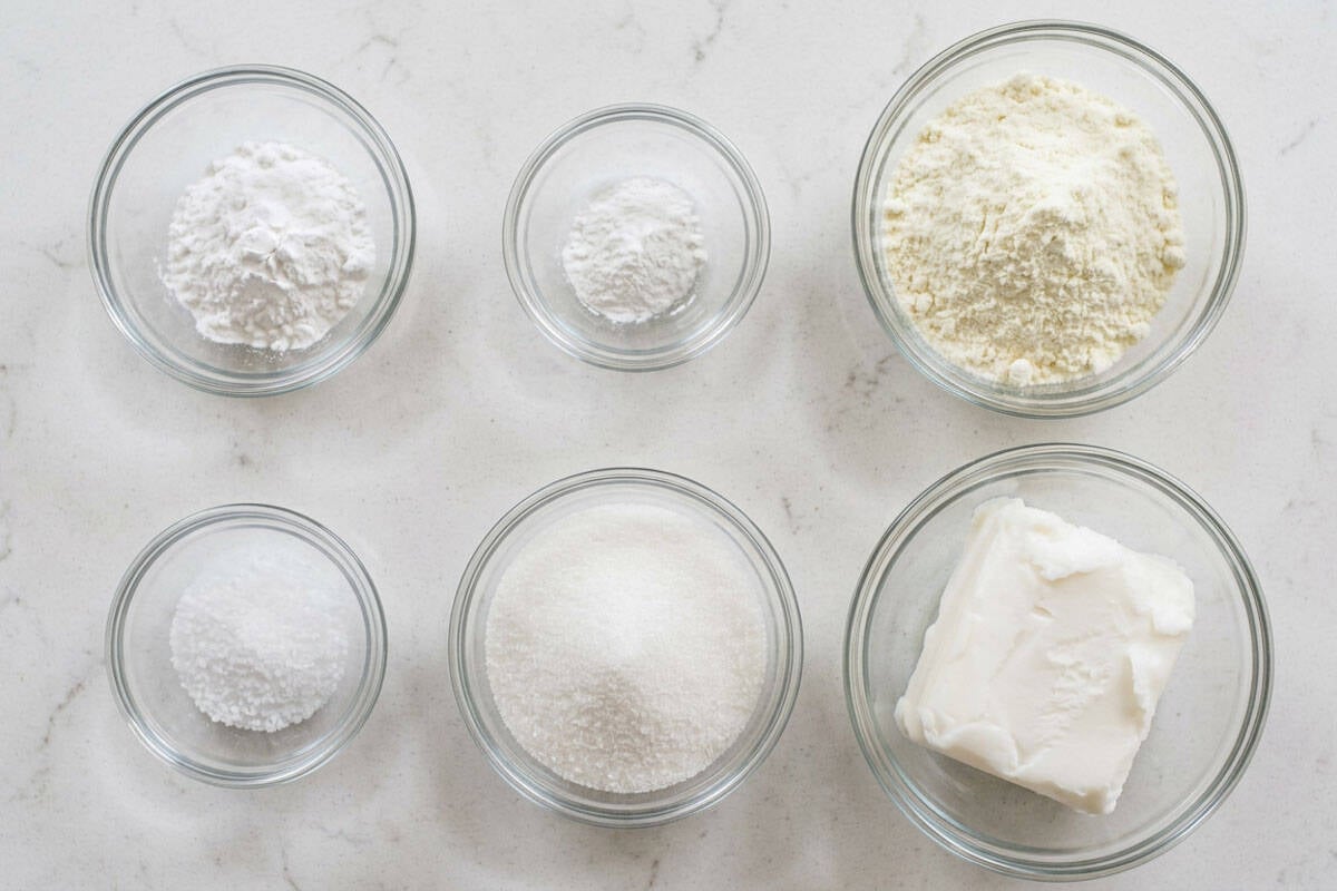 Flour, baking powder, powdered milk, salt, shortening, and cream of tartar.
