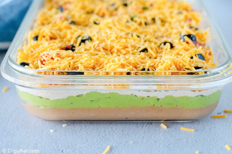 7 layer dip in a glass serving dish