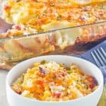 cheesy scalloped potatoes and ham casserole in a bowl and baking dish