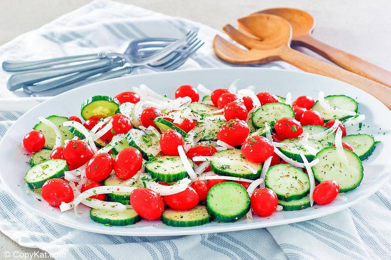 homemade Cracker Barrel cucumber tomato and onion salad and forks