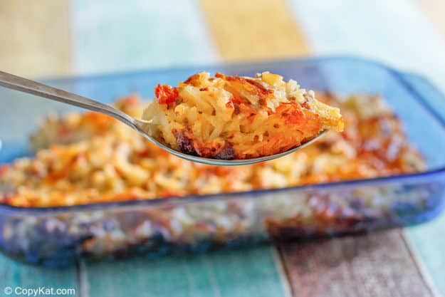 homemade loaded hash brown casserole on a spoon