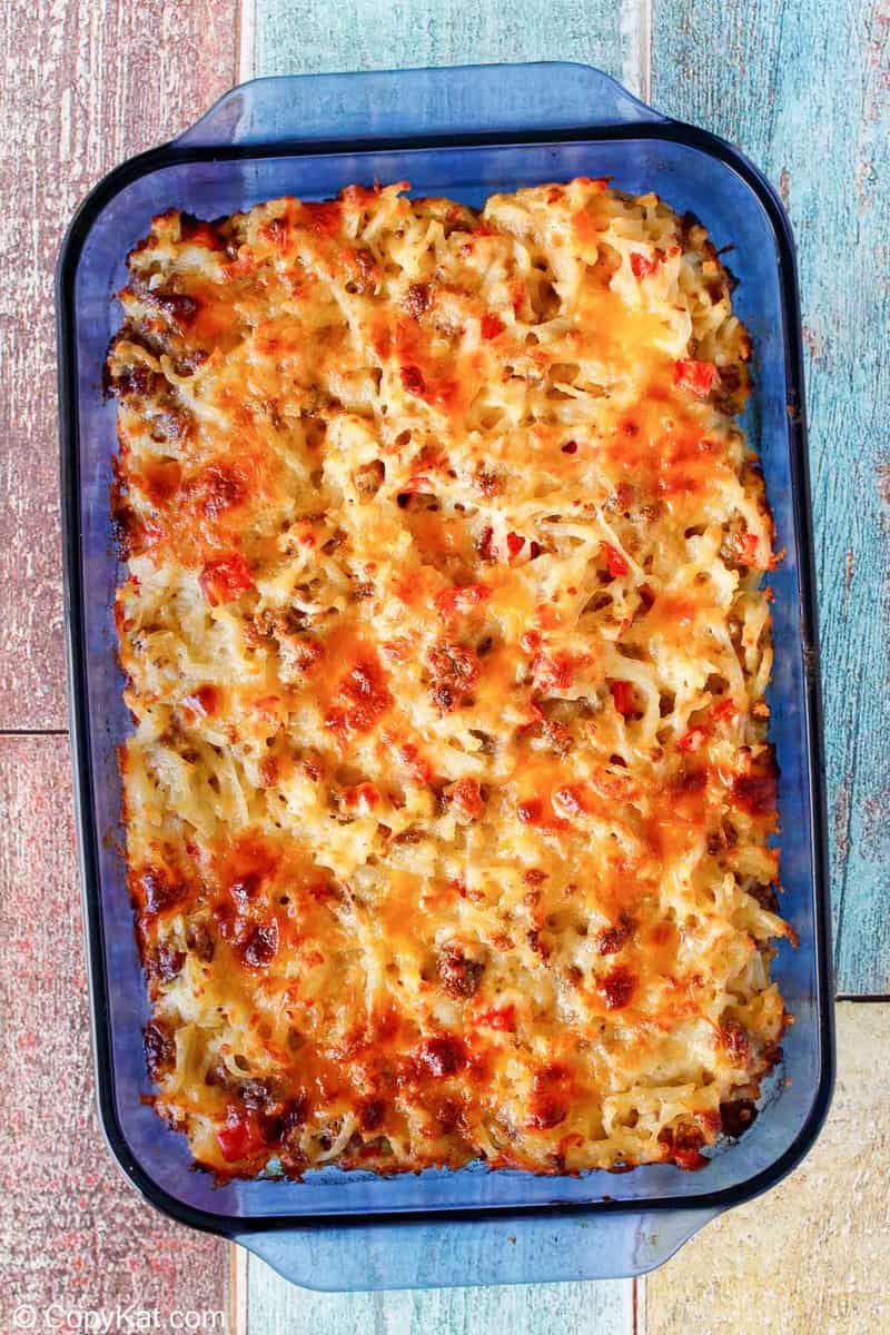 overhead view of homemade Cracker Barrel loaded hash brown casserole in a baking dish