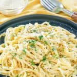 fettuccine noodles with creamy alfredo sauce on a plate