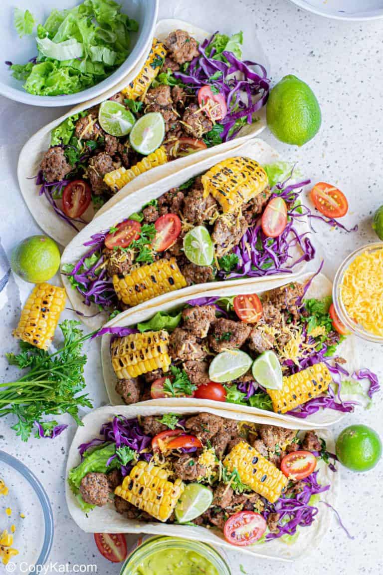 overhead view of four ground beef tacos