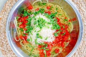 capellini pomodoro ingredients in a large bowl