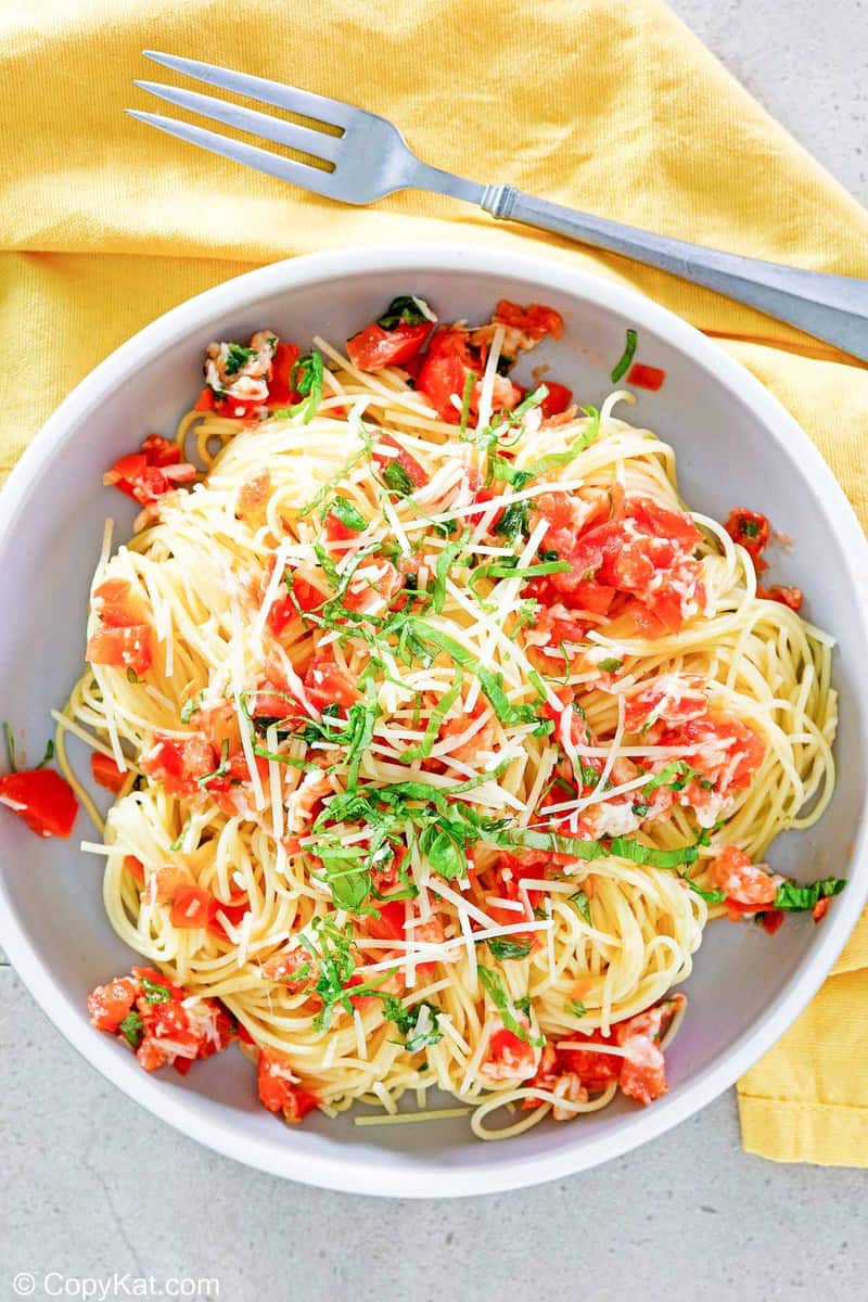 overhead view of copycat Olive Garden Capellini Pomodoro in a bowl