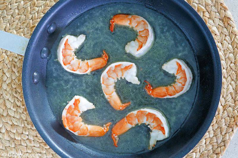 six shrimp in a skillet