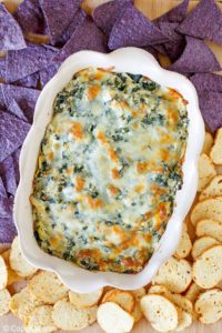 homemade Olive Garden spinach artichoke dip, crostini, and tortilla chips