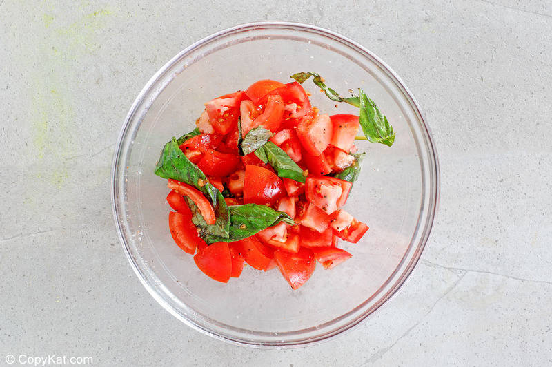 chopped tomato and basil in a bowl