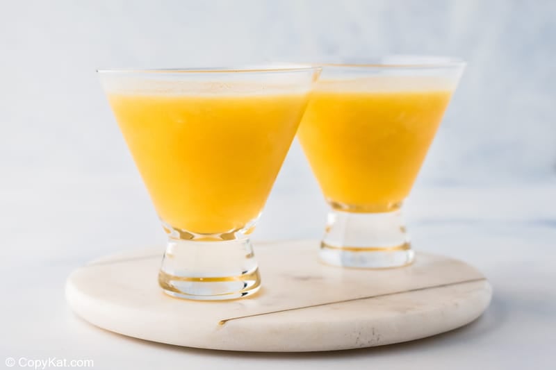 two Outback Wallaby Darned frozen cocktails on a round marble platter