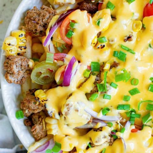 overhead view of homemade Taco Bell Nacho Fries BellGrande in a bowl