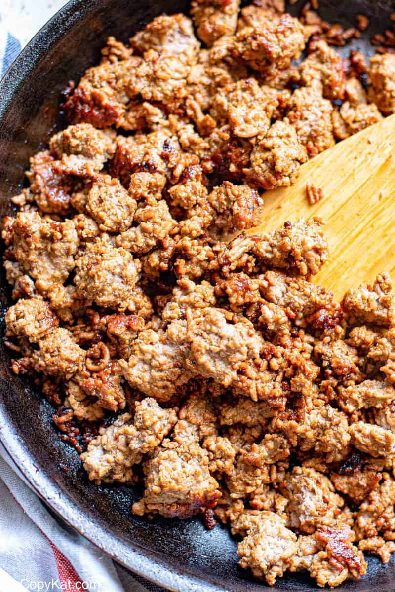 cooked taco seasoned ground beef in a skillet