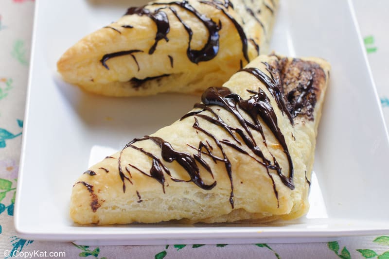 two chocolate turnovers on a plate