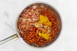 ingredients for BBQ baked beans in a pot