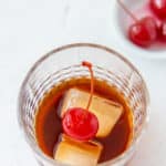 Black Russian drink with a cherry