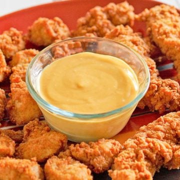 homemade Chick Fil A sauce and chicken nuggets on a platter