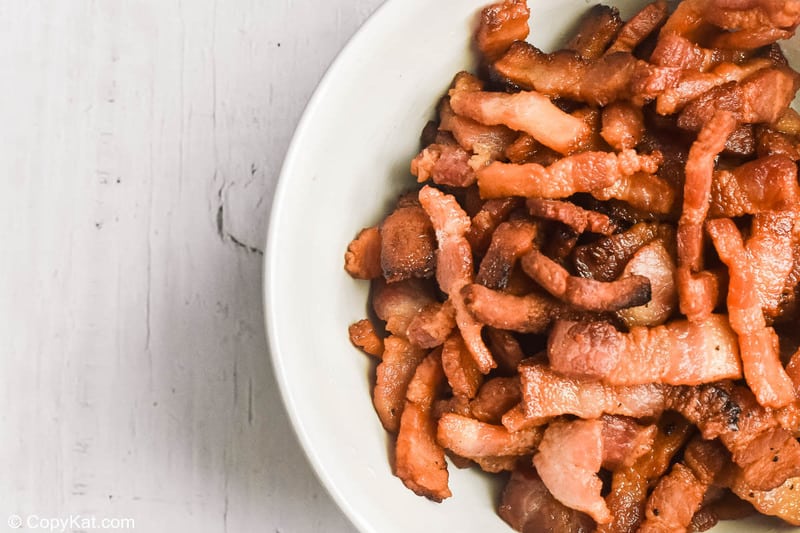 crispy cooked bacon pieces on a plate