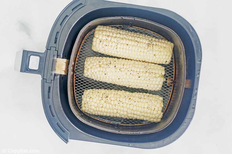 corn on the cob in an air fryer basket