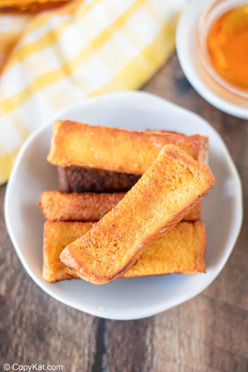 a bowl of french toast sticks