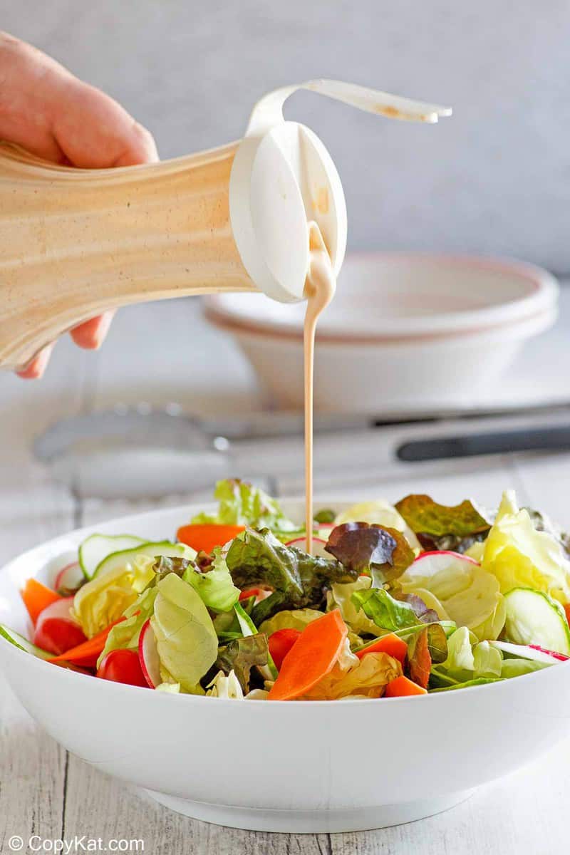 homemade Houston's Buttermilk Garlic Salad Dressing and a salad