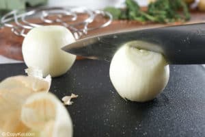 cutting an onion in half