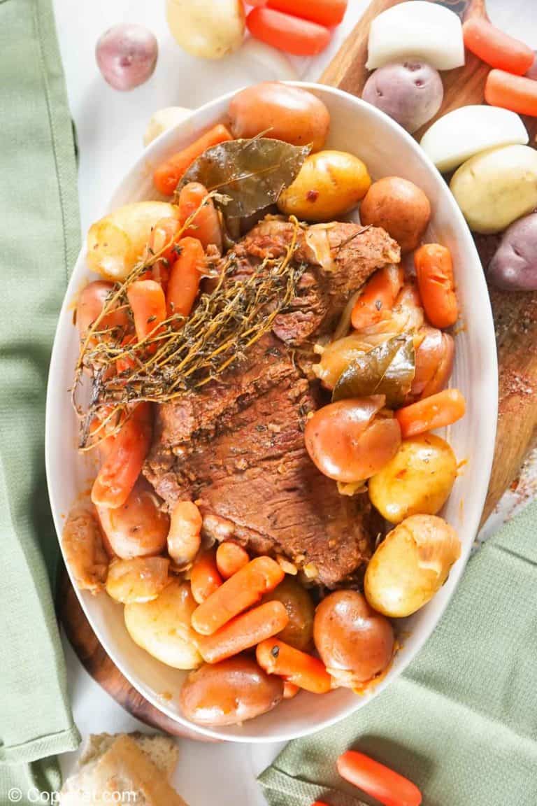 overhead view of Instant Pot tri tip roast and vegetables on a large platter