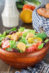 homemade Olive Garden salad in a wood bowl