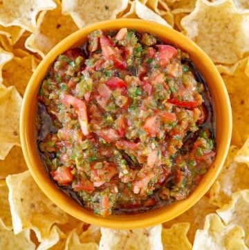 overhead view of homemade Pappasito's salsa in a bowl and tortilla chips