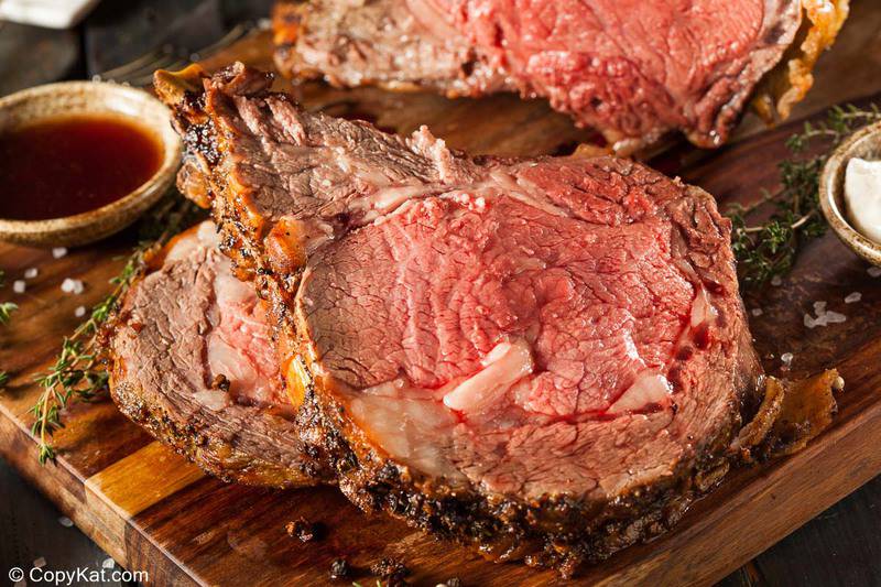 a slice of roast beef on a cutting board