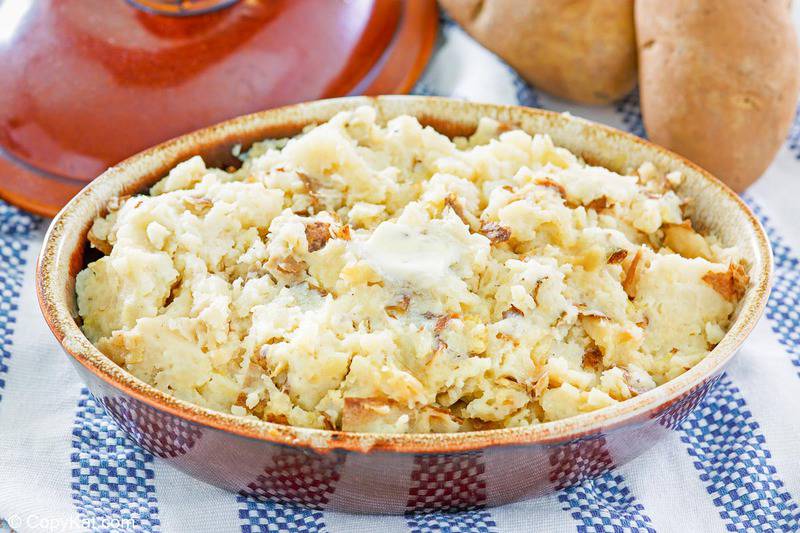 roasted garlic mashed potatoes in a serving dish