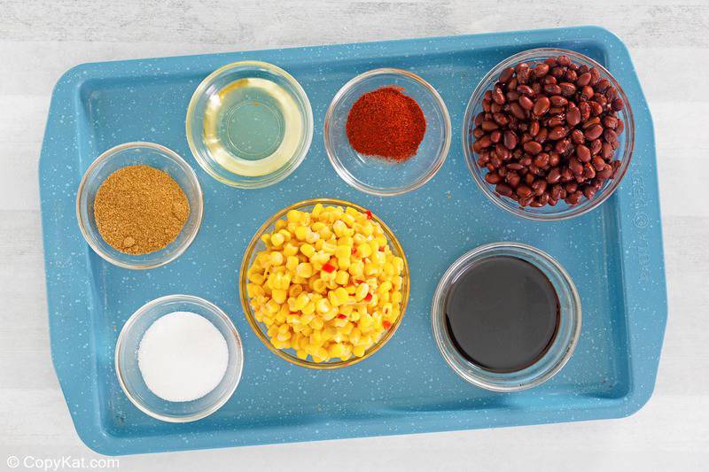 black bean and corn salad ingredients on a tray