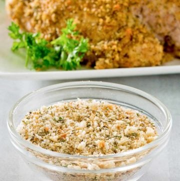 homemade Italian seasoned bread crumbs and a platter of breaded chicken