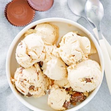 homemade peanut butter ice cream, peanut butter cups, and spoons