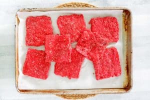 square shaped uncooked ground beef patties